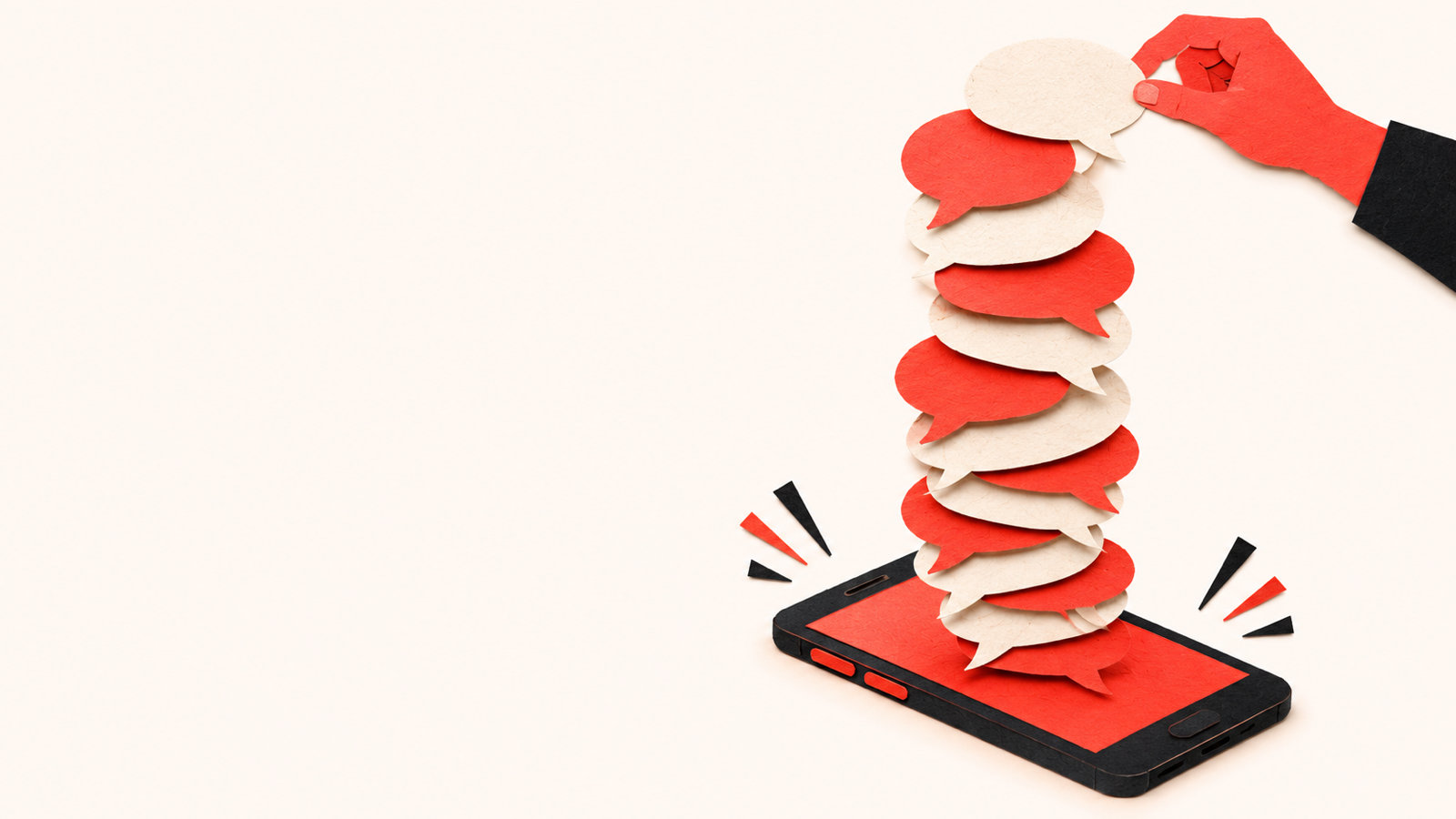 Cut-paper collage of a phone on a desk with a tall stack of paper speech bubbles rising from it and a paper hand picking one off the top
